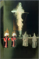 Mohammed and the Klan,
        2007 / 
        lenticular (mixed media) / 
        71 x 48 x 1 inches (180.3 x 121.9 x 2.5 cm) / 
        Private collection