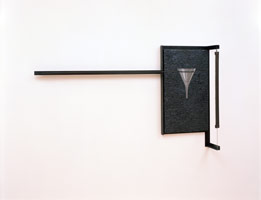 Val der Vergetelheid, 1987 / 
coalstar on plaster on burlap and wood, steel construction with glass funnel and bandsaw / 
43 x 75 x 13 in (109.2 x 190.5 x 33 cm)