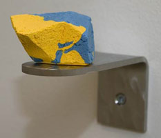 Some More For The Road #3, 2007 / 
        pigmented acrylic reinforced plaster, stainless steel wall brackets / 
        2 x 3 1/8 x 2 1/8 in. (4.9 x 8 x 5.5 cm)
