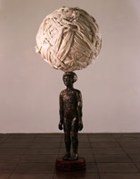 Alison Saar / Inheritance, 2003 / 
Wood, ceiling tin, and cotton / 
72 x 29 x 29 in (182.9 x 73.7 x 73.7 cm) / 
Private collection 