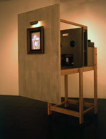 Don Suggs / 
Picture Machine, 1993 / 
mixed media construction with 2 slide projectors / 
78 x 39 x 56 in. (198.1 x 99.1 x 142.2 cm)