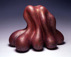 Kabongy Balls, 2002 / 
acrylic on fired ceramic / 
16 x 21 1/2 x 16 in (40.6 x 54.6 x 40.6 cm) / 
Private collection