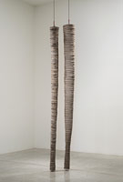 Peter Shelton / 
Big Legs, 1983 / 
      cement, steel and mixed media  / 
      (two elements) / 
      Element 1: Height 112 / Diameter 9 1/2 in.  / 
      (284.5 x 24.1 cm) / 
      Element 2: Height 109 / Diameter 7 1/2 in.  / 
      (276.9 x 19.1 cm) / 
      Private collection 