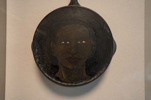 Alison Saar / 
Skillet Study 'Elizha', 2001 / 
Found iron skillet with acrylic paint / 
20 1/4 x 23 1/4 x 5 1/2 in (51.4 x 59 x 14 cm)