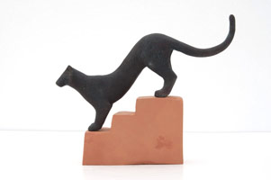 Gwynn Murrill / 
Cat Walking Downstairs Maquette, 2008 / 
bronze; ceramic / 
3 1/2 x 9 1/4 x 1 1/2 in. (8.9 x 23.5 x 3.8 cm);  / overall: 7 1/4 x 9 1/4 x 5 1/2 in. (18.4 x 23.5 x 14 cm) / 
Edition 1/9 