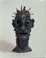 Spike Head, 1988 / 
cast bronze in glass case / 
19 x 13 x 10 1/4 in (48.3 x 33 x 26 cm)