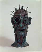 Spike Head, 1988 / 
cast bronze in glass case / 
19 x 13 x 10 1/4 in (48.3 x 33 x 26 cm)