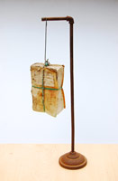 Michael C. McMillen / A Divine Comedy (after Dante Alighieri's 'Divina Commedia'), 2011 / Assemblage: altered book, salt, copper, iron / 27 1/4 x 10 1/2 in (69.2 x 26.7 cm) / 
Base: 5 in diameter (12.7 cm)