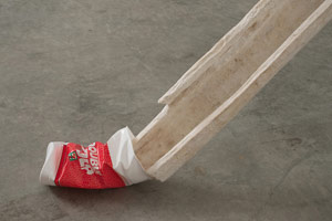 Olga Koumoundouros / 
Trickle Down (detail), 2009 / 
toilet paper; starch; metal stud; double gulp cup / 
96 x 276 x 12 in. (243.8 x 701 x 30.5 cm)
 