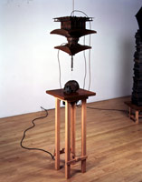 Peter Shelton /  
pagodawindowskull, 1993 /  
cast bronze and water /  
68 x 16 x 16 in (172.7 x 40.6 x 40.6 cm) /  
Private collection 