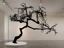 Rebecca Campbell / 
Do You Really Want to Hurt Me, 2009 / 
      tree: avocado tree, steel, velvet, and fiberglass; / 
      birds: Windex, glass, and bronze / 
      overall: 13' x 16 ' x 18'