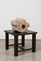 Richard Deacon / 
Fold in the Fabric 5, 2018 / 
Sculpture: wood (Holly and Cedar), epoxy / 
Table: fumed oak and MDF board / 
Sculpture: 12 1/4 x 13 3/4 x 11 in. (31 x 35 x 27.8 cm) / 
Table: 18 x 21 5/8 x 21 5/8 in. (45.5 x 55 x 55 cm)