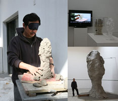 Sui Jianguo / 
Photo series depicting Blind Portrait, 2008: / 
the creation process, didactic video, and final installation of the sculpture / 
steel frame and mud, 216.54 in. (550 cm)  / 
 / 
Sui creates the <i>Blind Portraits</i> by working blindfolded /  with clay, creating sculptures, unmediated by vision. /  The works are first modeled in clay, enlarged and cast /  in bronze. 