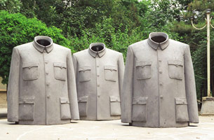 Sui Jianguo / 
Legacy Mantle, 1997 / 
Fiberglass / 
94.49 x 62.99 x 35.43 in. (240 x 160 x 90 cm) each / 
 / 
The <i>Legacy</i> series marks Sui’s first use of the Zhongshan suit. The /  series began with sculptures of standalone jackets with corroded /  surfaces; later the jackets were created with brightly colored, glossy /  surfaces. The sculptures serve as an attempt to confront and release  / “the excitement and inhibition associated with this object.”