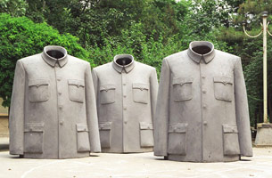 Sui Jianguo / 
Legacy Mantle, 1997 / 
Fiberglass / 
94.49 x 62.99 x 35.43 in. (240 x 160 x 90 cm) each / 
 / 
The <i>Legacy</i> series marks Sui’s first use of the Zhongshan suit. The /  series began with sculptures of standalone jackets with corroded /  surfaces; later the jackets were created with brightly colored, glossy /  surfaces. The sculptures serve as an attempt to confront and release  / “the excitement and inhibition associated with this object.”