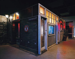 Edward & Nancy Reddin Kienholz / 
      The Hoerengracht, 1983 - 1988 / 
      mixed media tableau / 
      120 x 520 x 280 in (305 x 1321 x 712 cm)