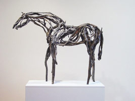 Deborah Butterfield / 
Blackwood, 2006 / 
cast bronze / 
42 x 53 x 16 in. (106.7 x 134.6 x 40.6 cm) / 
Private collection New York, NY