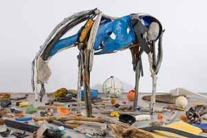 Deborah Butterfield / 
Three Sorrows (quake, tsumani, meltdown from
Gretel Ehrlich in Facing the Wave), 2016 / 
Cast bronze, wood, plastic and wire primary element: 81 x 100 x 40 in. (205.7 x 254 x 101.6 cm) / 
found floor objects: dimensions variable