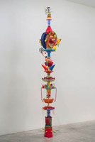 Don Suggs / 
Acid-trope Feast Pole, 2008 / 
      plastic objects, metal armature / 
      approx. 144 x 16 x 28 in. (365.8 x 40.6 x 71.1 cm)