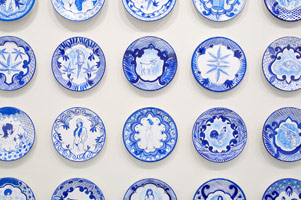 Eduardo Sarabia / 
History of the World, 2008 / 
hand painted ceramic plates / 
each 12.6 in. (32 cm)