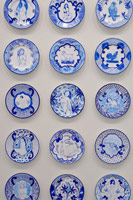 Eduardo Sarabia / 
History of the World, 2008 / 
hand painted ceramic plates / 
each 12.6 in. (32 cm)