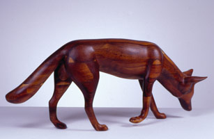 Gwynn Murrill / 
Coyote I, 1983 / 
Laminated Koa wood / 
21 x 51 x 9 in (53.34 x 129.54 x 22.86 cm)