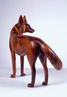 Gwynn Murrill / 
Coyote III, 1983 / 
Laminated Koa wood / 
30 1/2 x 38 x 13 in (77.5 x 96.5 x 33 cm)