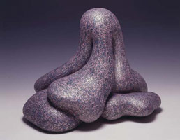 Wide Load, 2004 / 
acrylic on fired ceramic / 
18 H x 23 x 19 1/2 in (45.7 x 48.4 x 49.5 cm) / 
Base size: 44 H x 34 x 34 in (117.8 x 86.4 x 86.4 cm) / 
Private collection
