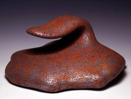 Ken Price / 
Flare, 2000 / 
acrylic on fired ceramic / 
11 1/2 x 23 1/2 x 23 1/2 in (29.2 x 59.7 x 59.7 cm) / 
Private collection 