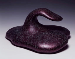 Ken Price / 
Mo, 2000 / 
acrylic on fired ceramic / 
13 x 24 x 28 1/2 in (33 x 61 x 72.4 cm) / 
Private collection 