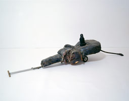 Ed Kienholz / 
Lolli Pop Goes the Weasel, 1962 / 
mixed media floor piece / 
22 x 20 1/2 x 9 1/4 in. (55.9 x 52.1 x 23.5 cm)
 