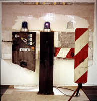 Edward & Nancy Reddin Kienholz / 
Still Live, c. 1974 / 
mixed media installation w/ loaded gun on timer / 
15 x 15 feet (4.6 x 4.6 meters)