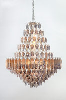 Matthew Brandt / 
Dining Room 8870, 2020 / 
photo fused glass on painted metal chandelier armature / 
28 x 23 x 23 in. (71.1 x 58.4 x 58.4 cm)
