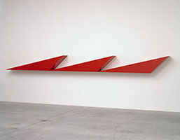 John McCracken / 
RA, 1991 / 
polyester resin & fiberglass on plywood / 
21 1/2 x 230 x 14 in (54.6 x 584.2 x 35.6 cm) / 
Private collection
